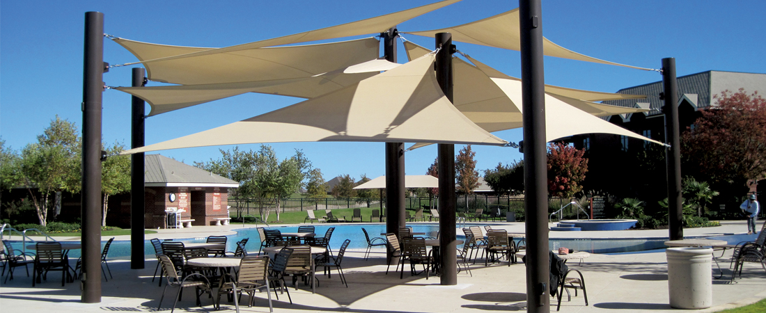 Fabric shade structures on outdoor seating area 